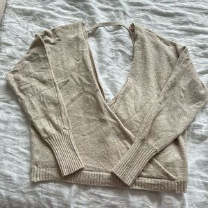 Shrinking violet plunge sweater